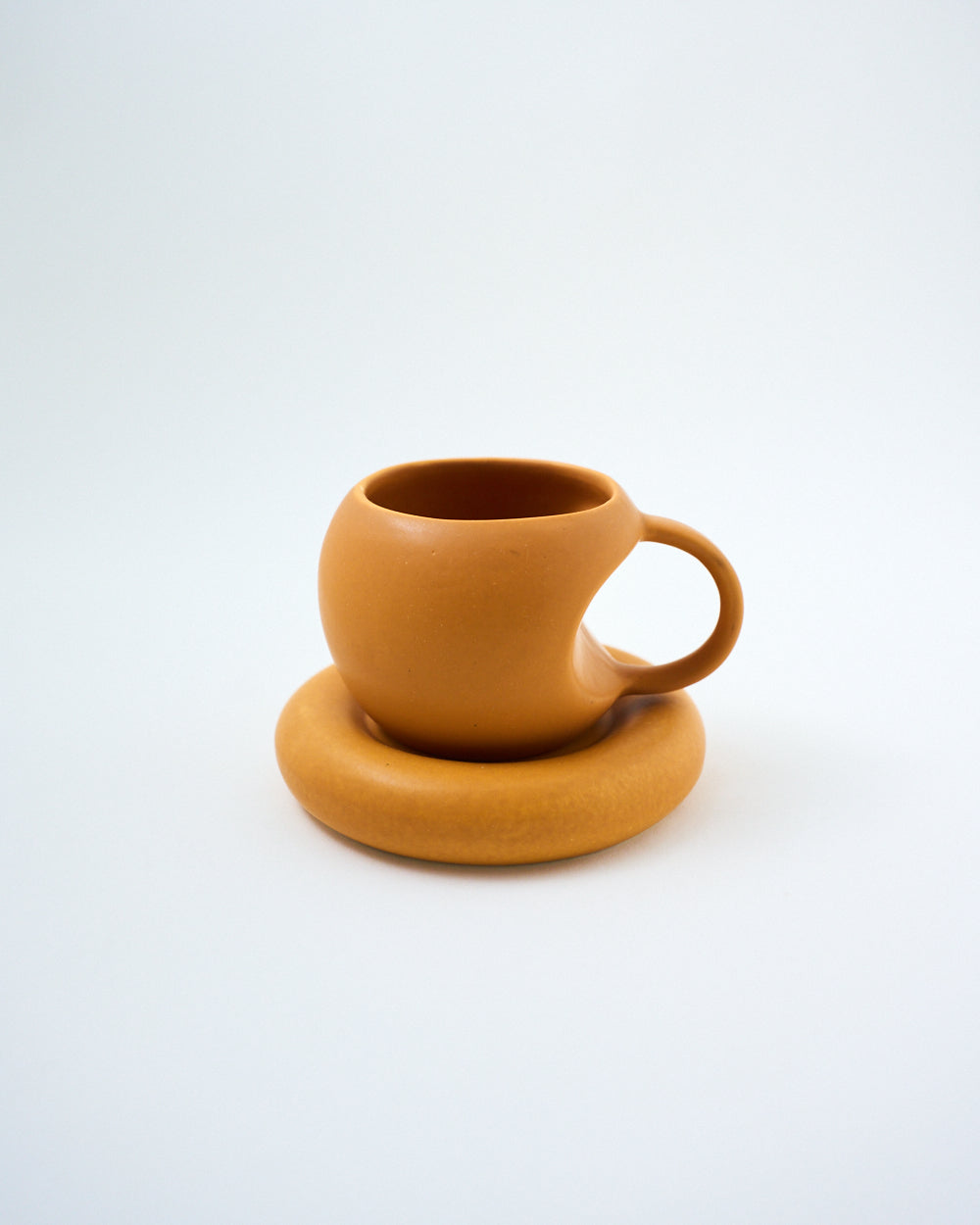 cavity coffee mug and saucer set