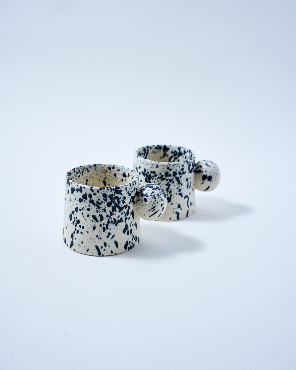 coffee mug with a ball handle