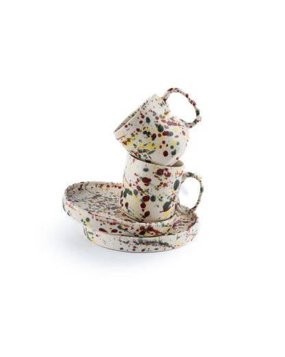coffee mug and saucer set with splash effect