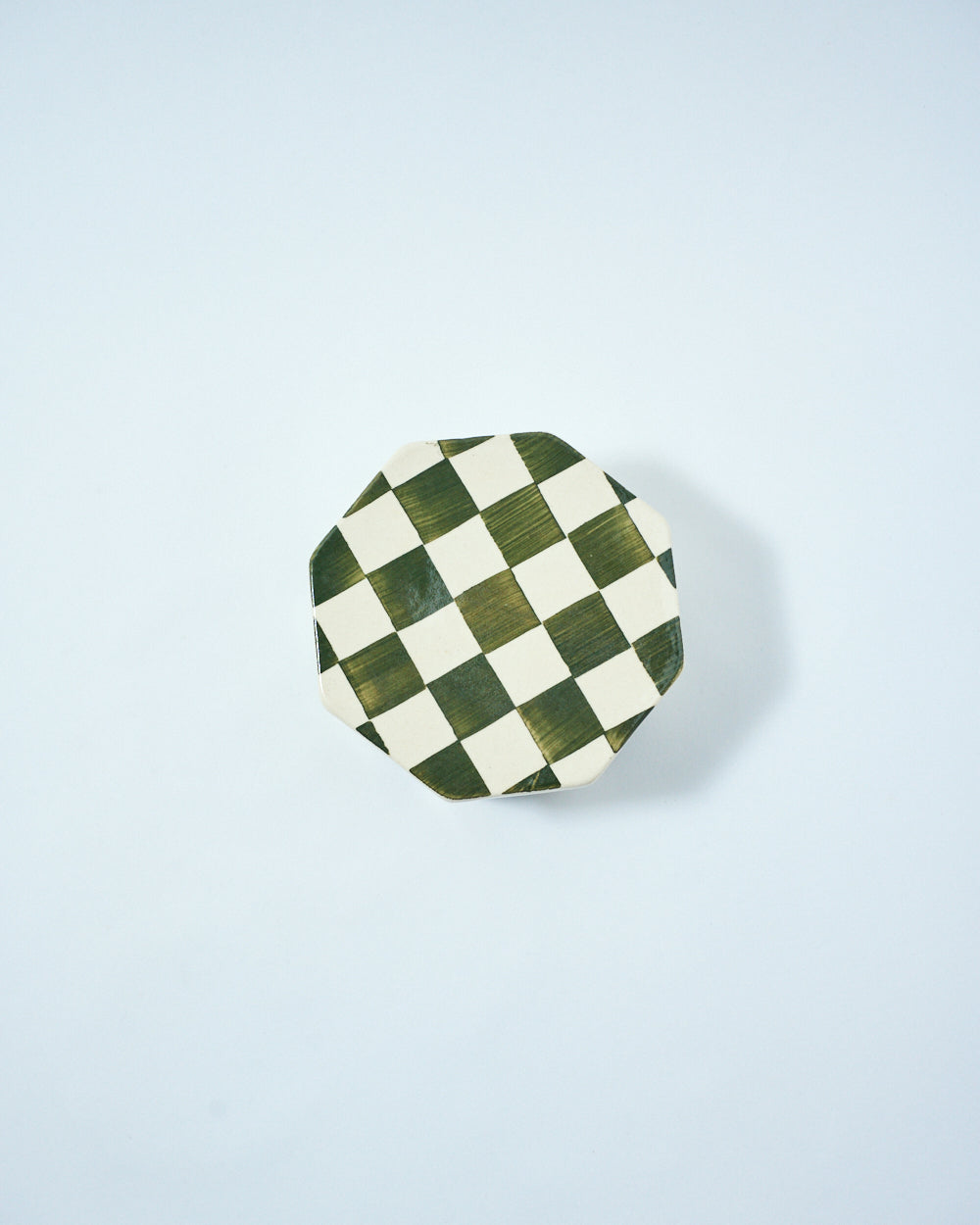 octagon shaped ceramic container with a lid
