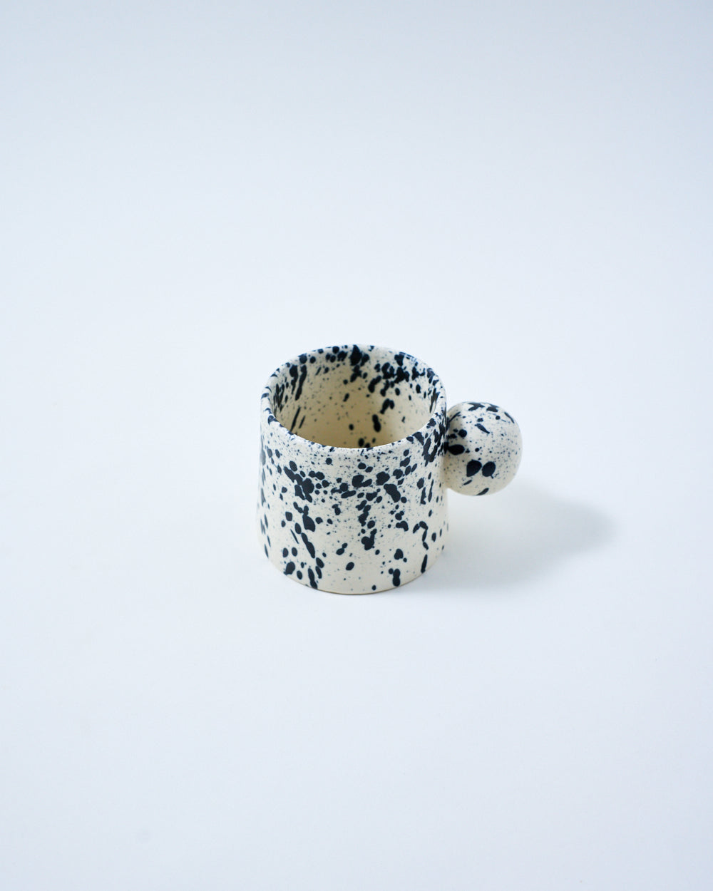 coffee mug with black speckles