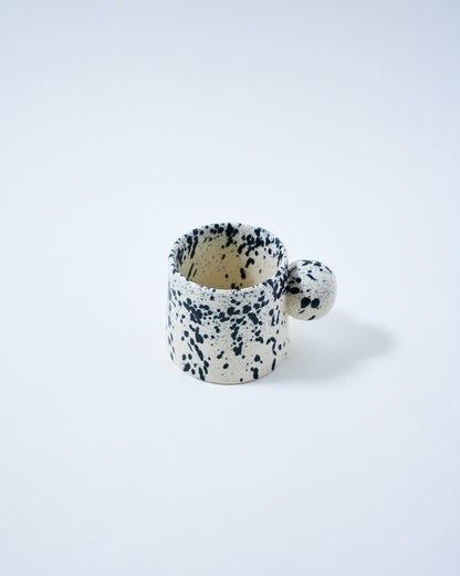 coffee mug with black speckles