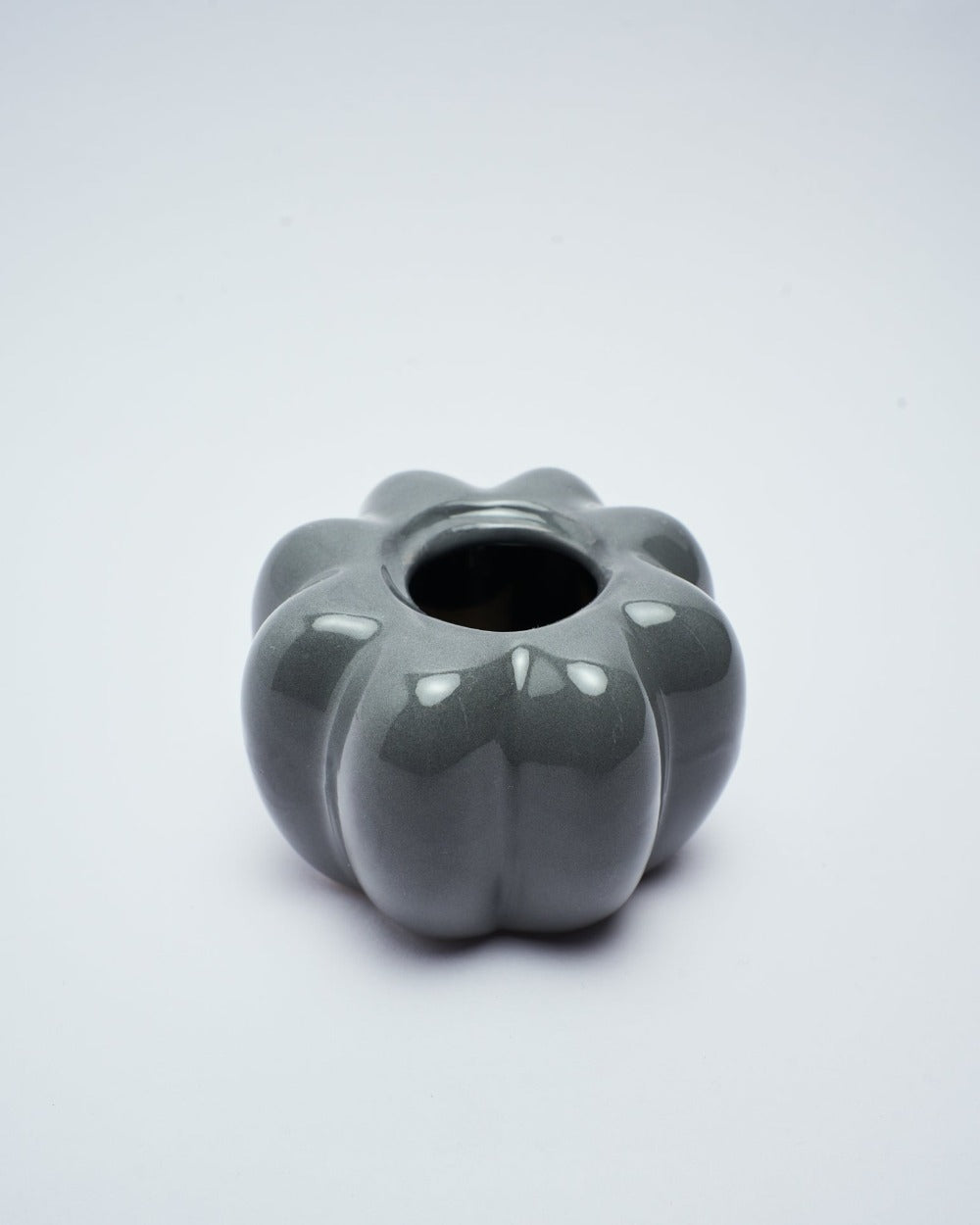 pumpkin candle holder in gray color