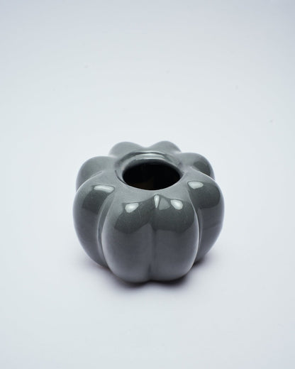 pumpkin candle holder in gray color