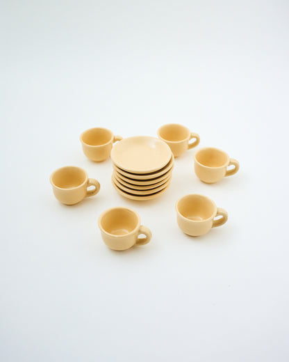 tiny tea cup and saucer set