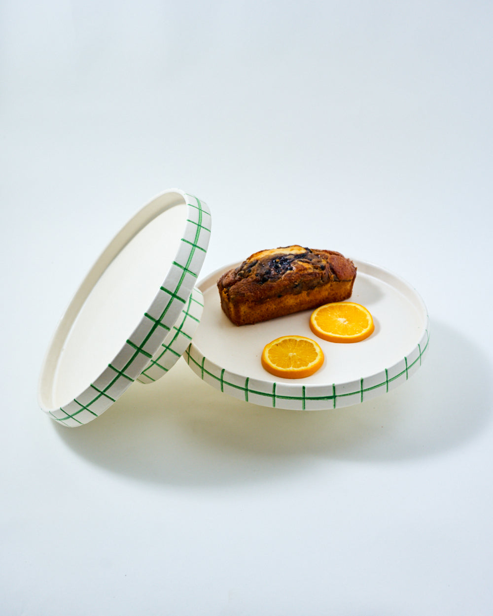 white and green cake stand