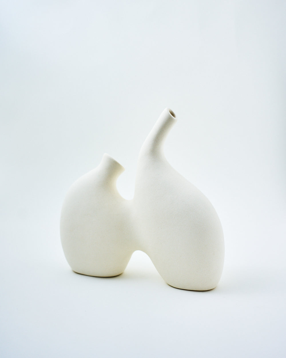 white ceramic vase aesthetic two holes