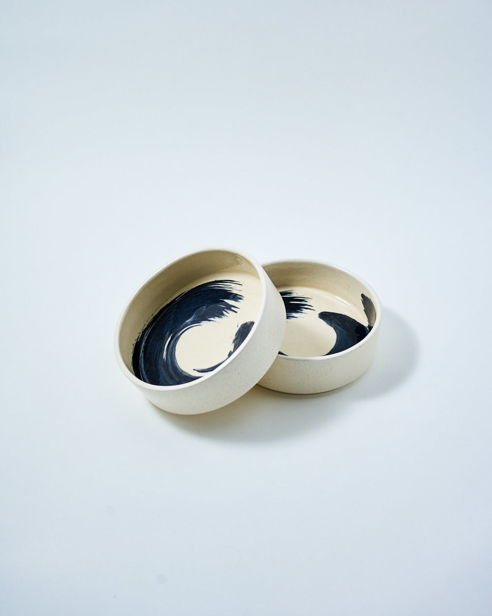 white and black cereal bowl