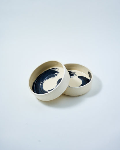 white and black cereal bowl