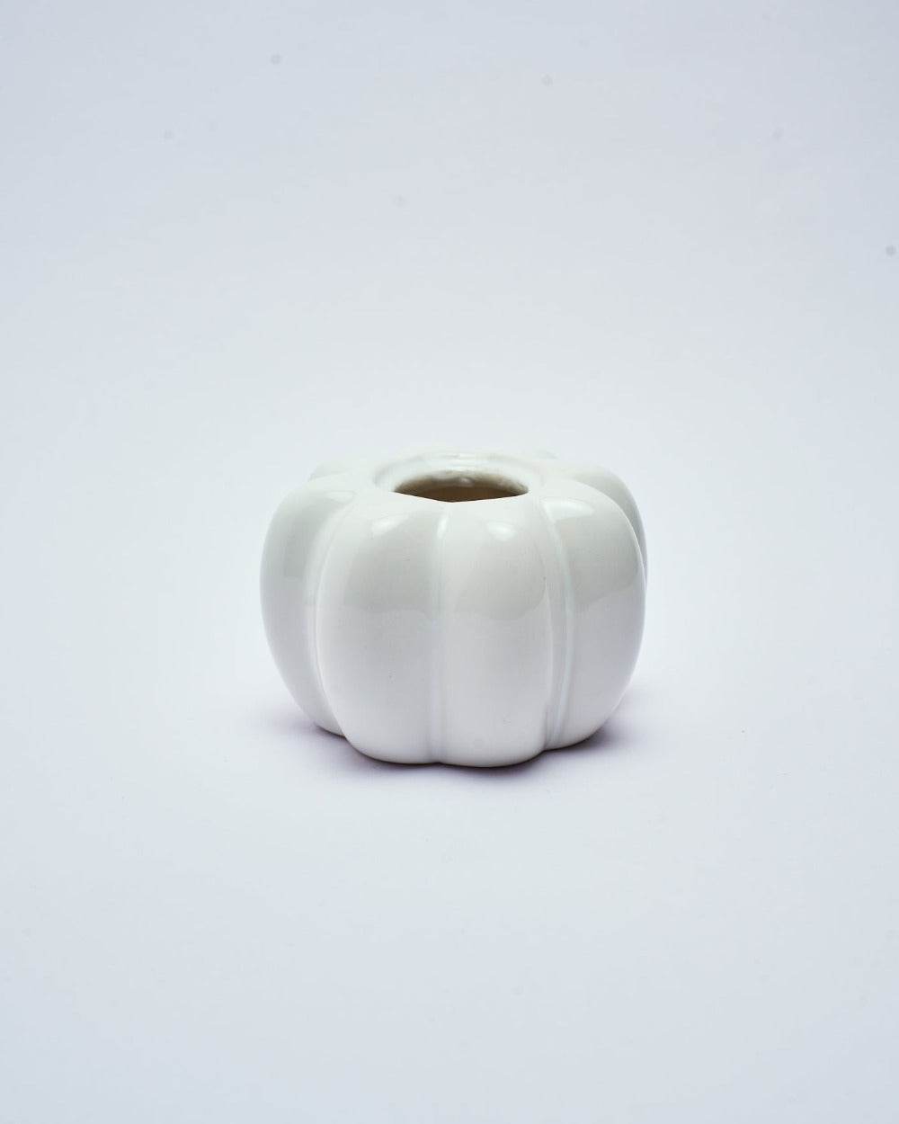 white pumpkin shape holder